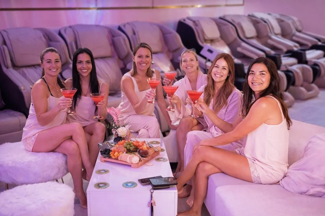 Six guests celebrating together in the lounge